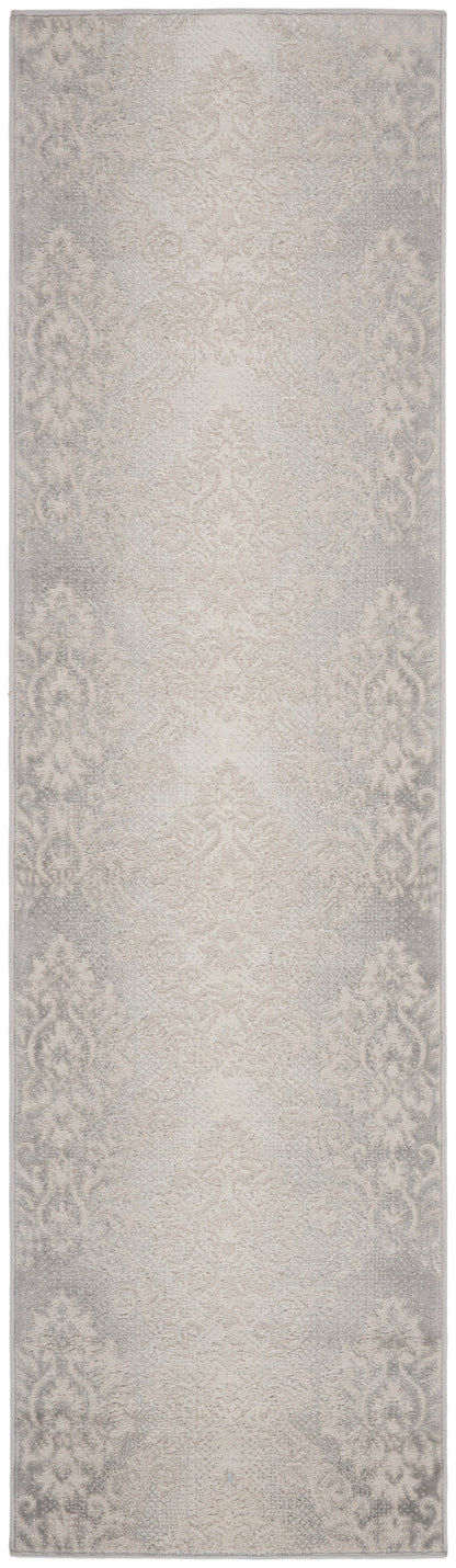 Beige runner rug with a subtle damask pattern in soft grey, decorative floor covering.