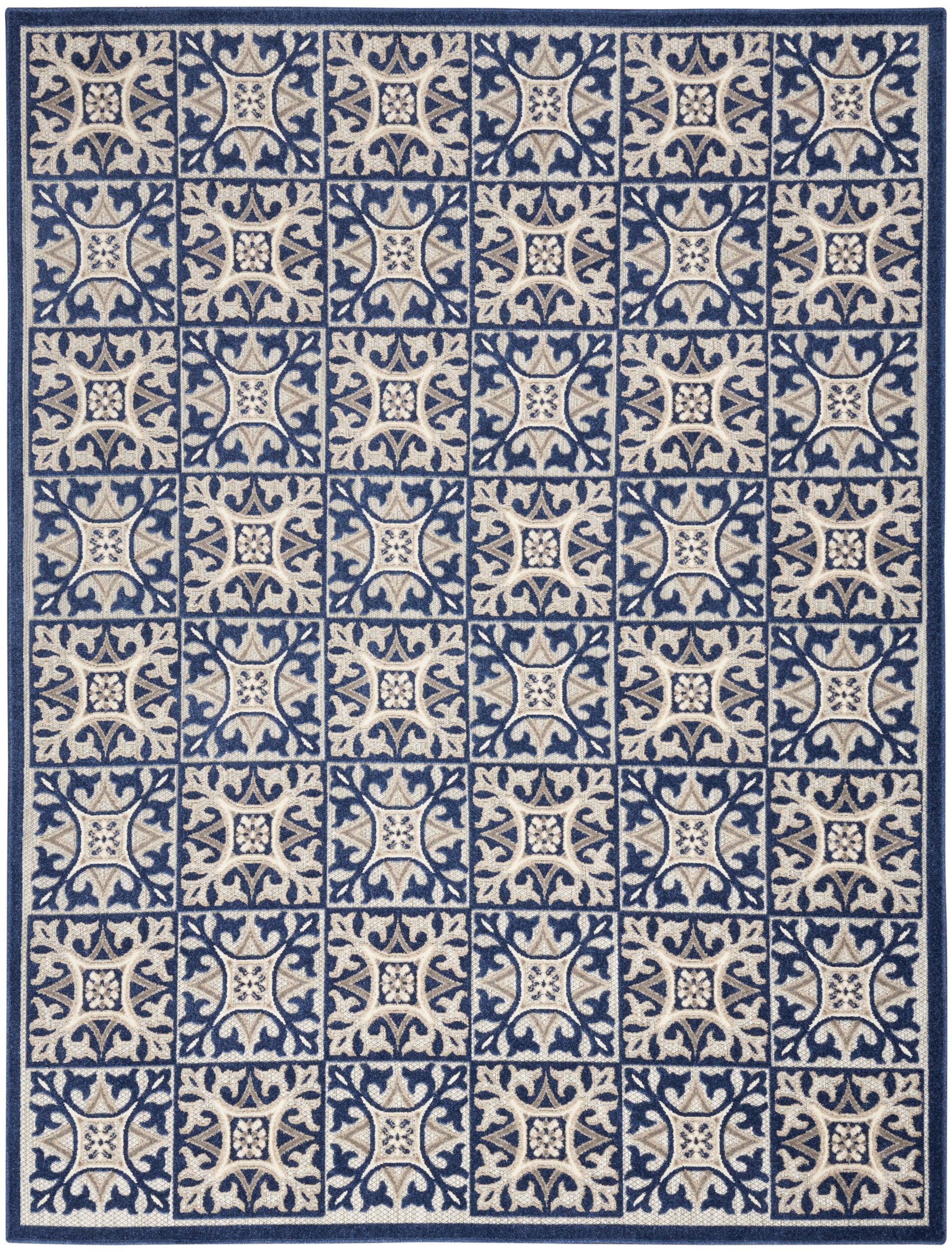 Rectangular rug in navy and cream with repeating square tile pattern and a dark blue border.