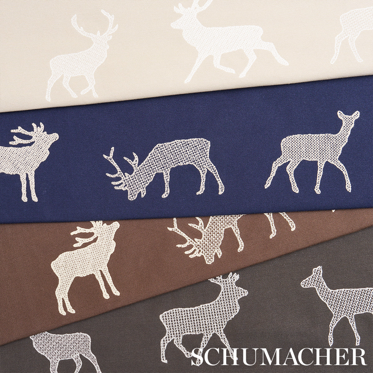 Charcoal woven fabric swatches with caribou embroidery motif; festive upholstery textile.