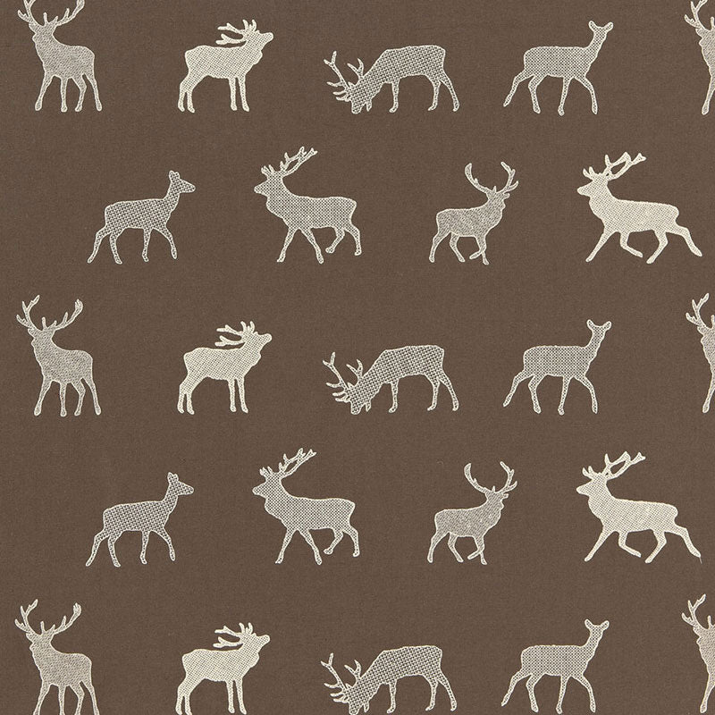Brown fabric featuring cream deer silhouettes in a repeating pattern.