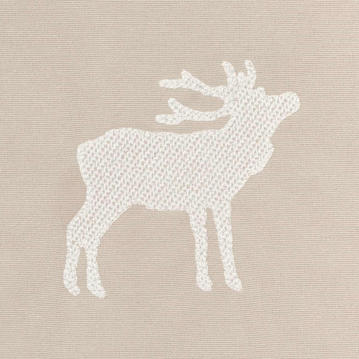 Beige parchment fabric with white caribou embroidery; knitted look, Nordic cozy decor.