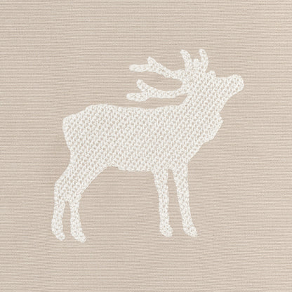 Beige parchment fabric with white caribou embroidery; knitted look, Nordic cozy decor.