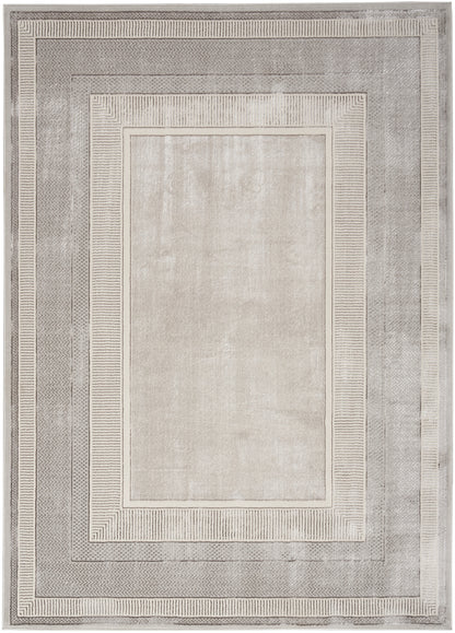 Grey rectangular area rug with layered border stripes and a light cream center for contemporary living spaces.