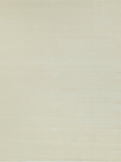 Cream beige hand-loomed rug with a linen-like texture and subtle horizontal weave.