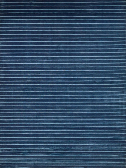 Navy blue striped rug with thin light-blue horizontal lines; soft textured textile for floor.
