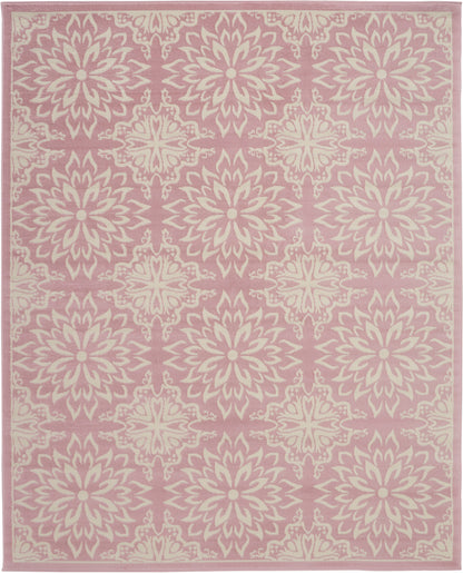 Pink rug with cream mandala rosette motifs in a repeating grid, bordered edges, soft woven texture.