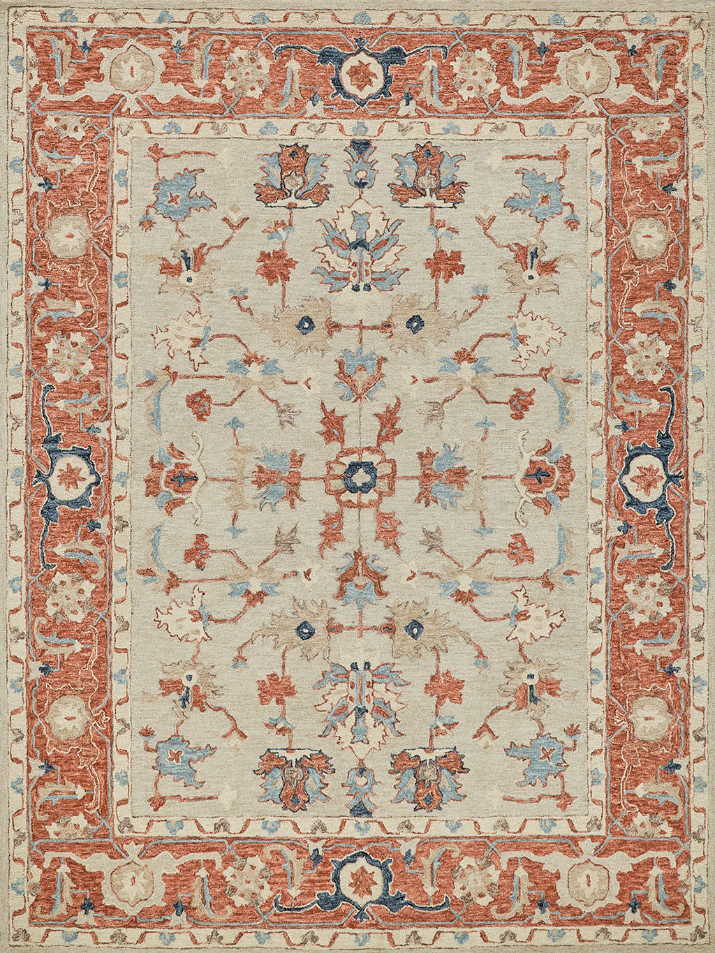 Persian-style area rug with cream field, red border, blue accents, and intricate floral medallion motifs.