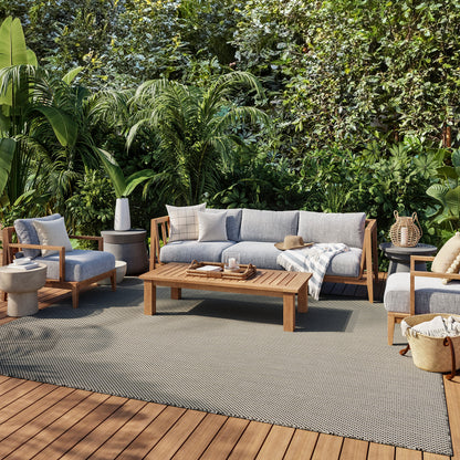 Outdoor rug, 8' x 10', modern style, shown on a patio.