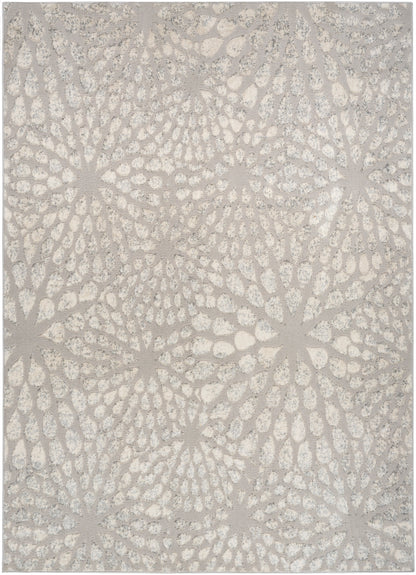 Textured ivory area rug with subtle beige circular starburst floral pattern; soft, woven look.