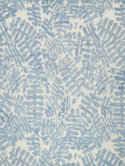 Blue and white abstract rug pattern with brush-like irregular shapes; indoor hand-tufted rug.