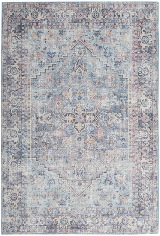 Blue-toned oriental area rug with a central medallion, floral motifs, and ornate border.