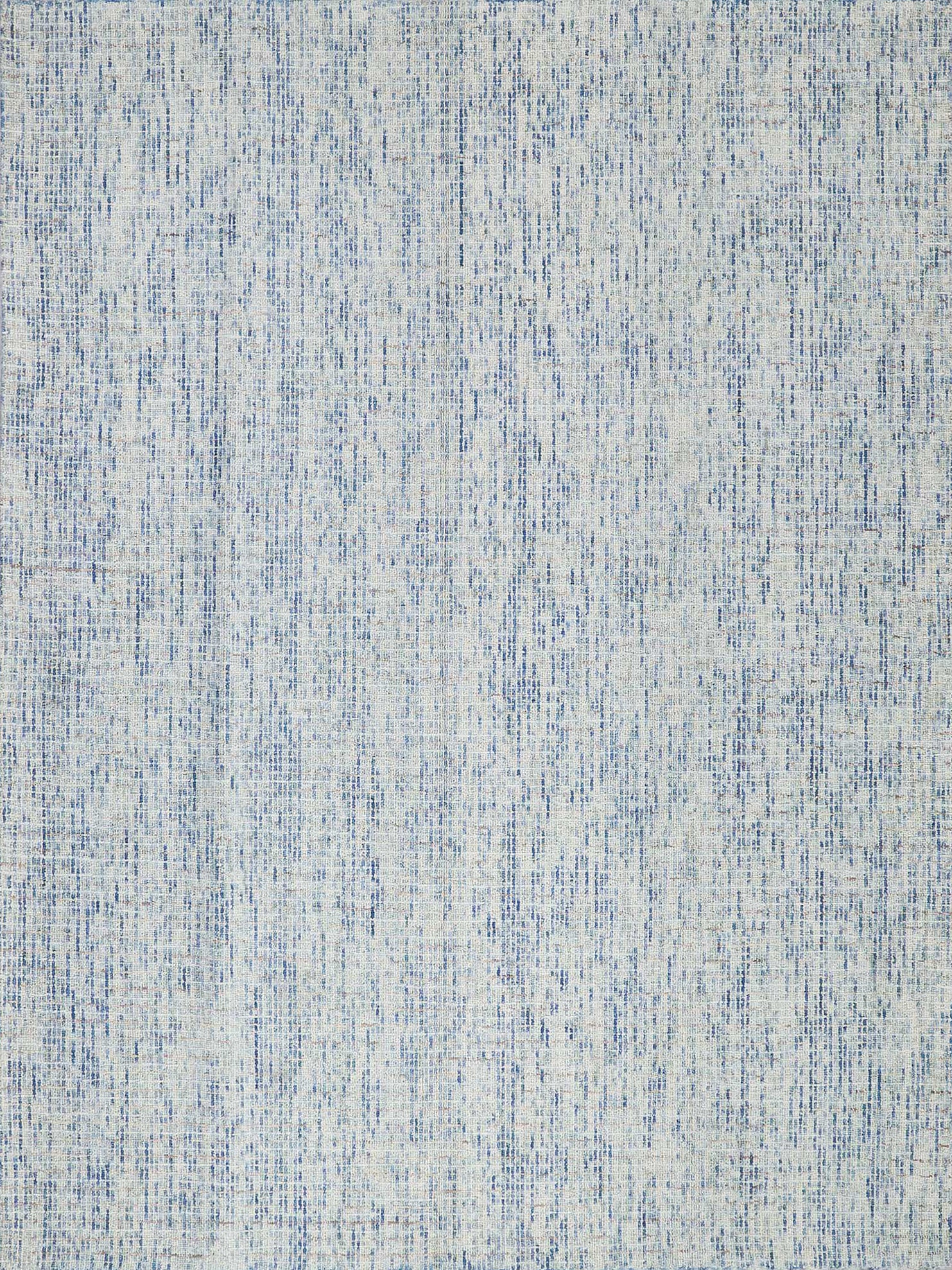 Blue and white distressed tufted rug with a soft linen-like texture and mottled pattern.