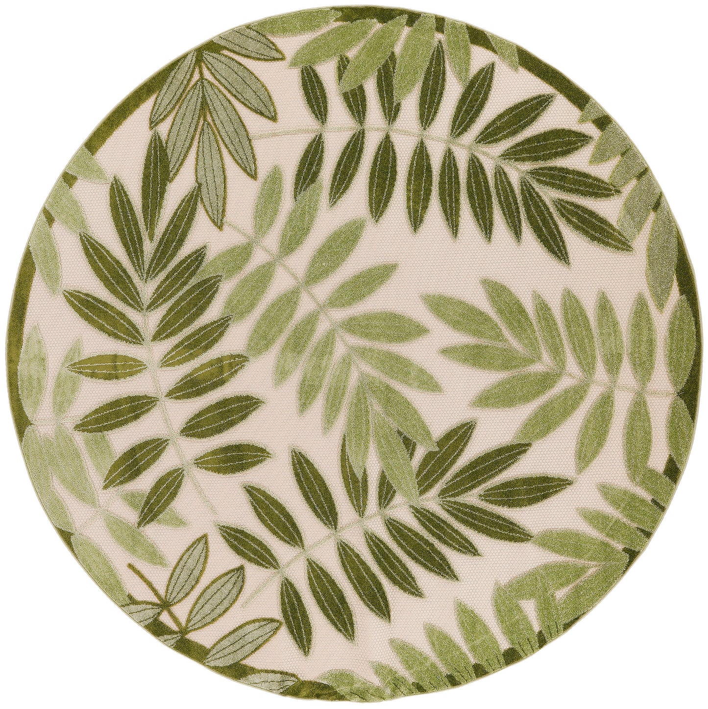 Round ceramic plate with green palm frond leaf pattern on beige background.