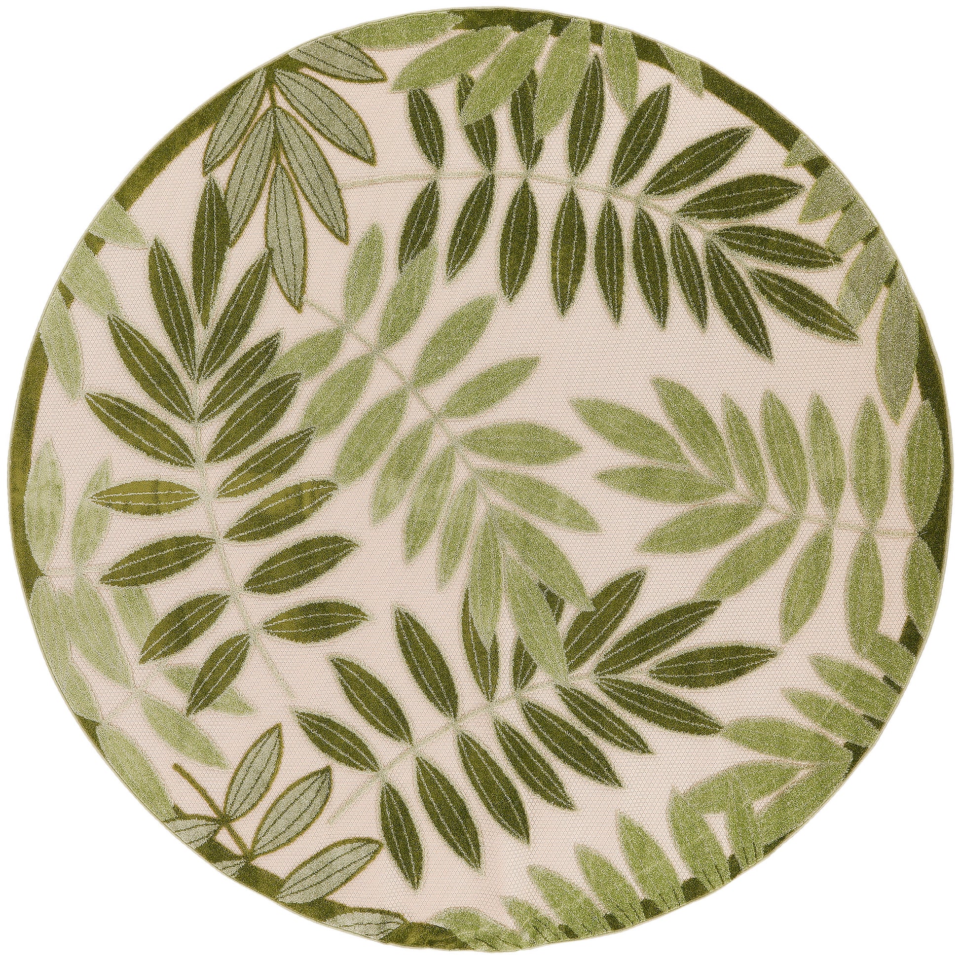 Round ceramic plate with green palm frond leaf pattern on beige background.