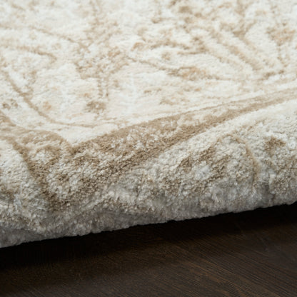 Cream shag rug with thick plush pile on dark wood floor; cozy, textured, vintage style; 5' x 7'.
