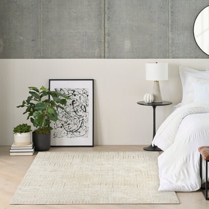 Modern 4' x 6' beige rug with subtle texture.