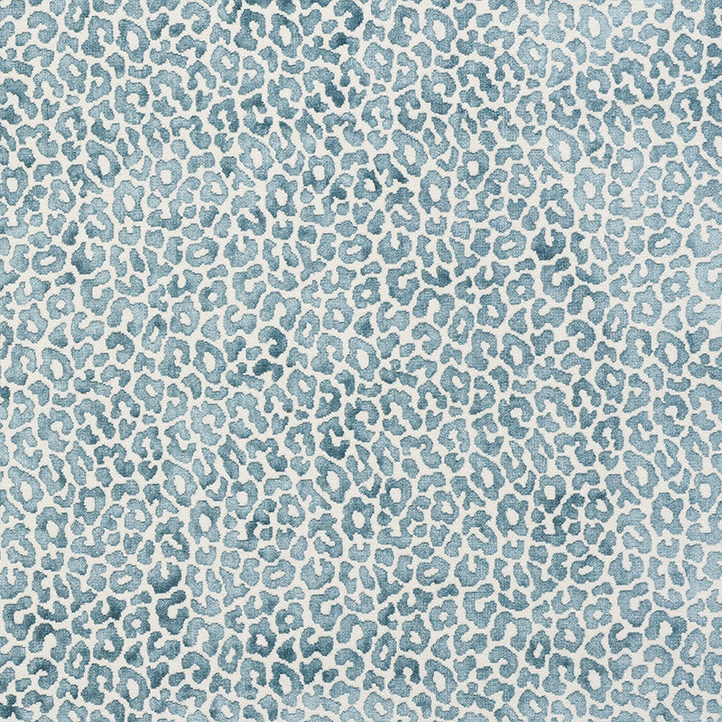 Blue leopard print pattern on light neutral background; soft fabric texture, chic style for apparel & home decor.