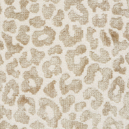 Cream-colored fabric with tan leopard spots in a plush boucle texture.