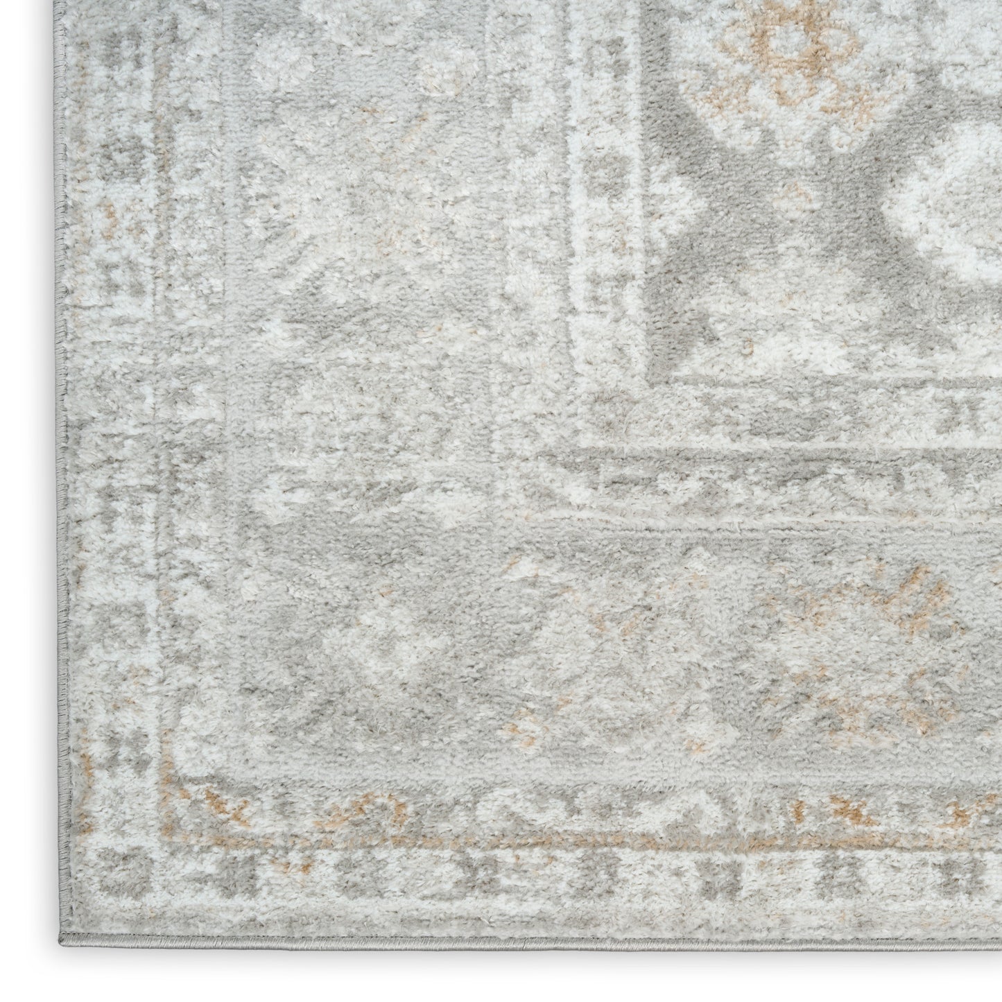 Soft gray & ivory distressed oriental-pattern area rug with beige accents.