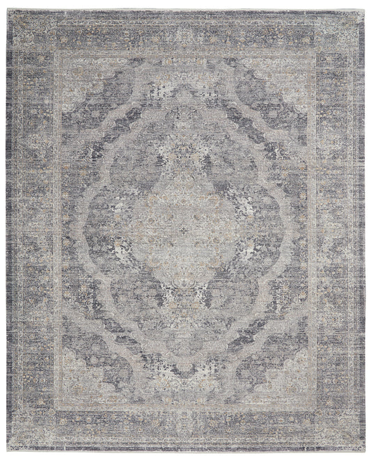 Rectangular distressed gray oriental rug with antique central medallion and muted ivory-blue border.
