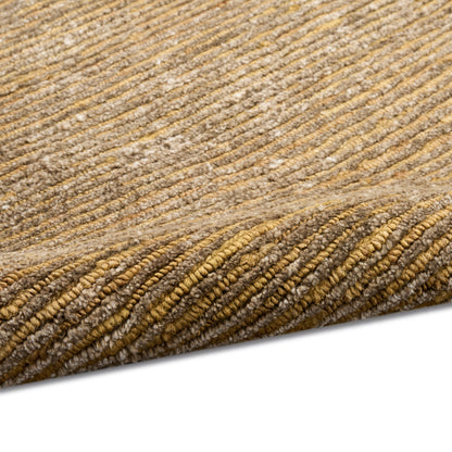 Warm beige striped rug with textured loop pile and rolled edge in tan and cream tones.