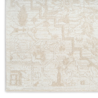 Beige textured area rug with subtle abstract geometric patterns in cream hues; low-pile, versatile living room accent.