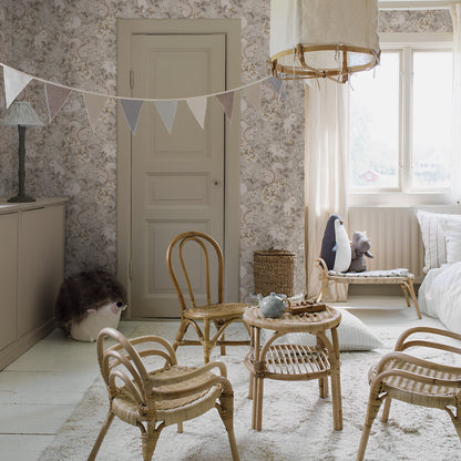 Taupe forest wallpaper with a subtle woodland motif on the wall.
