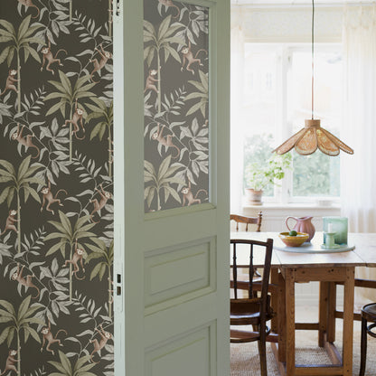 Sage green palm-leaf wallpaper.