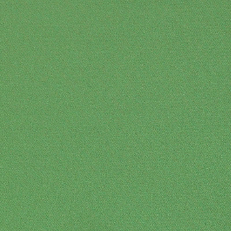Close-up of lime green textured fabric surface with subtle grain.