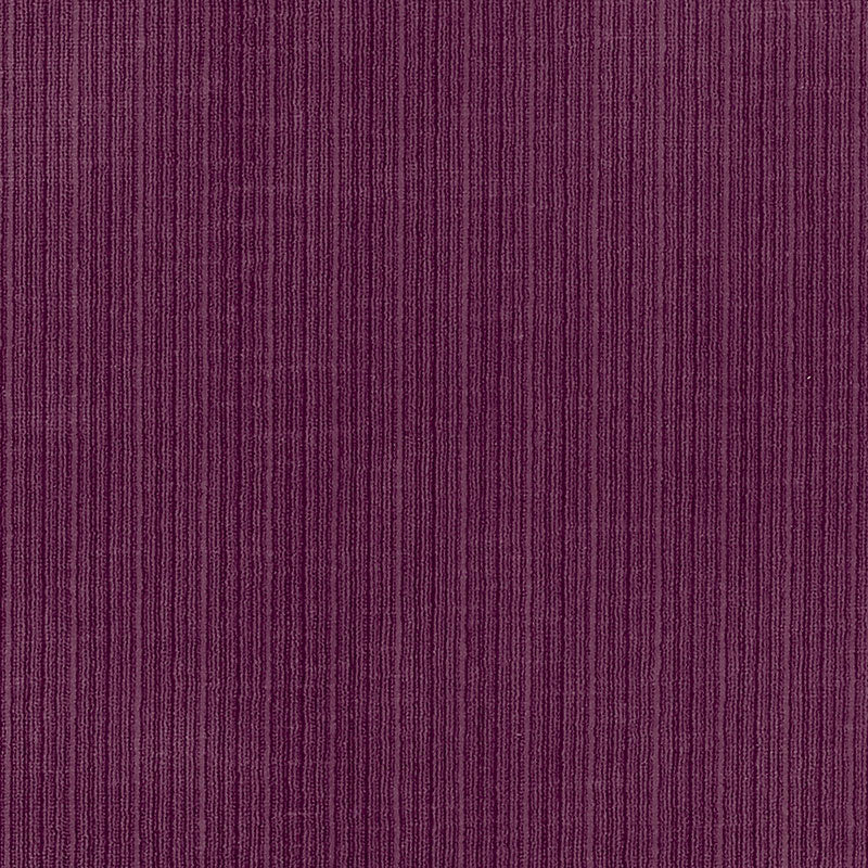 Purple corduroy fabric close-up with vertical ridges; textured textile for jackets or upholstery.