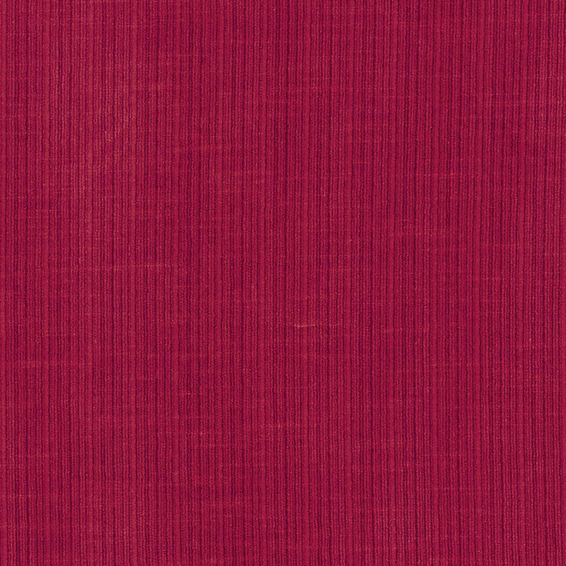Magenta corduroy fabric with narrow vertical ribs, rich pink-purple color, ideal for jackets, skirts, or upholstery.