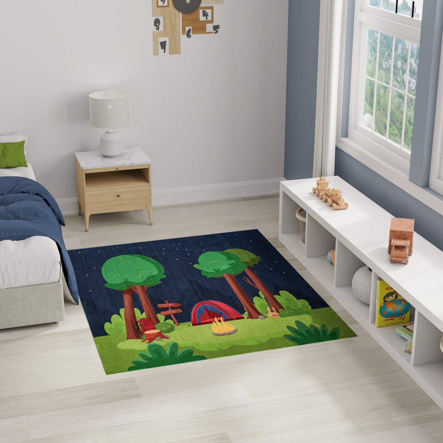 Soft rectangular kids' rug with a forest campsite scene - trees, campfire, and tent on a dark blue background.