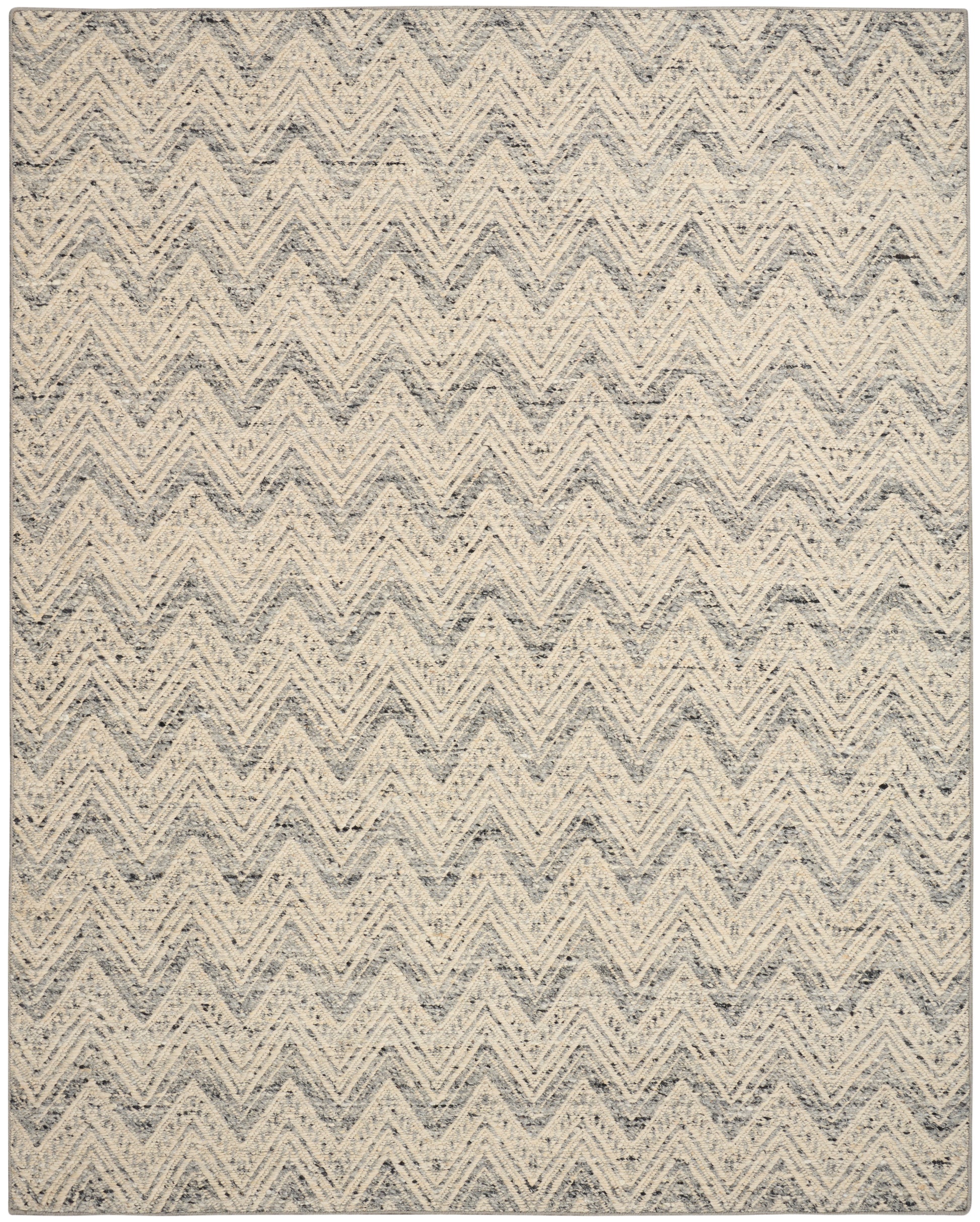 Beige and gray chevron-patterned area rug with textured woven fibers.