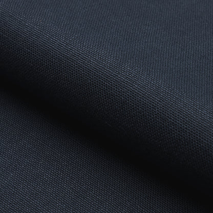 Close-up of deep navy woven fabric with a tight textured weave, suitable for apparel, bags or upholstery.