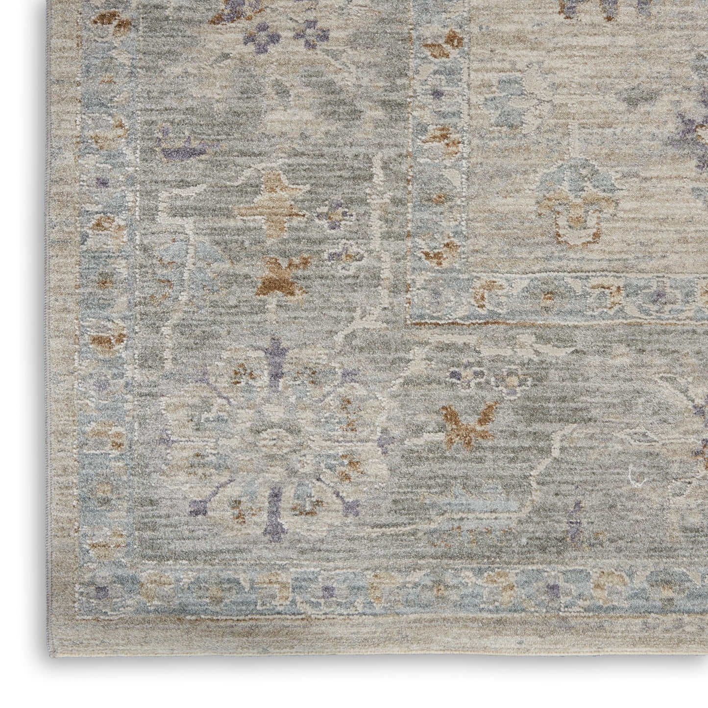 Rectangular distressed gray-blue rug with faded beige and rust floral motifs and a framed border for living rooms.