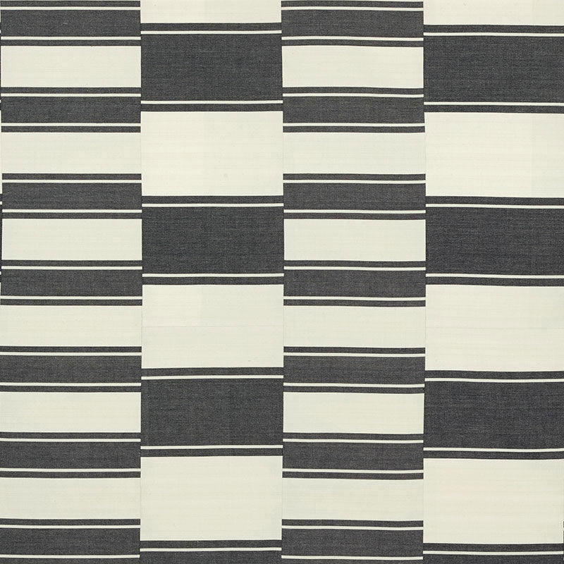 Geometric navy and ivory striped checker pattern with dark blocks and light panels, suitable for rug or fabric.