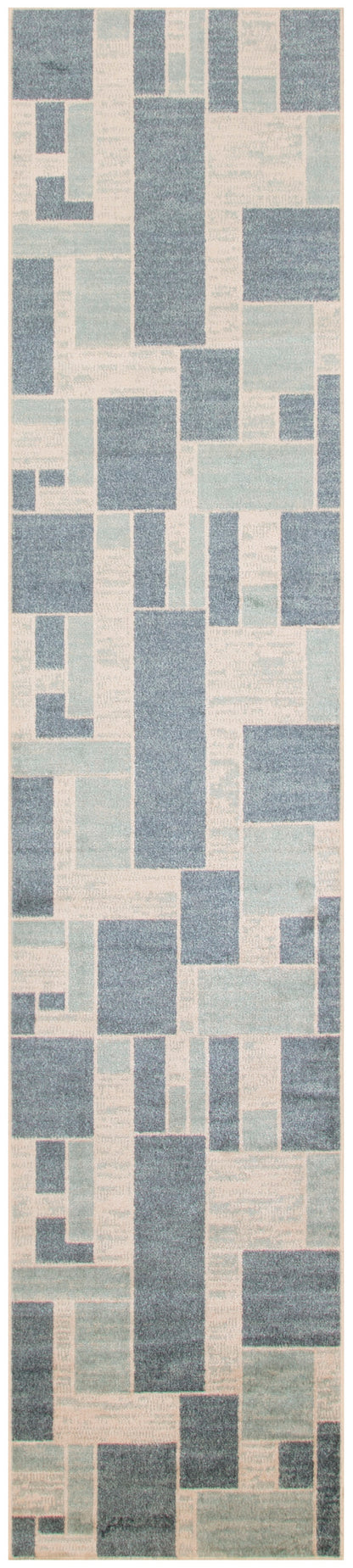Tall geometric rug in blue and cream with interlocking rectangular blocks in a mosaic layout.