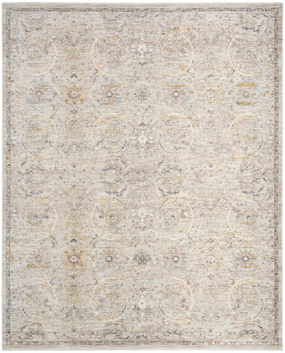 Neutral-toned distressed oriental area rug with soft floral medallion pattern in ivory, beige and pale blue.