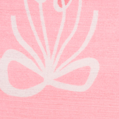 Pink textured rug with a white stylized orchid line-art pattern.