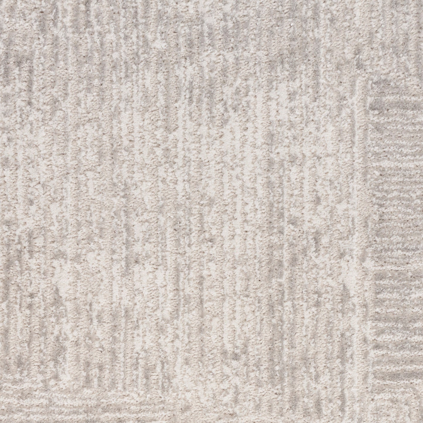 Beige-gray textured rug with subtle vertical linear pattern and soft woven pile.