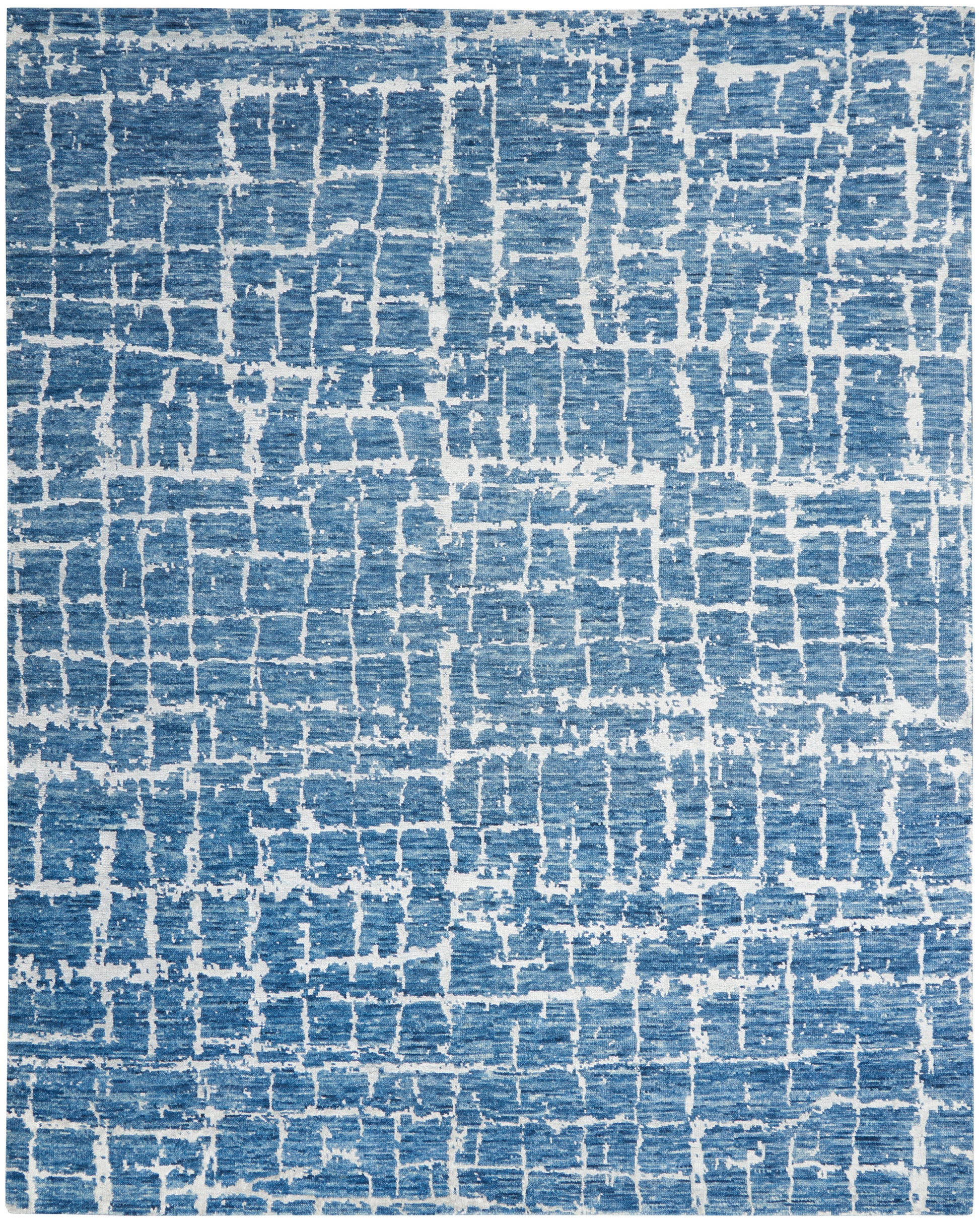 Blue distressed grid-pattern rug with white lines; rectangular, modern contemporary decor.