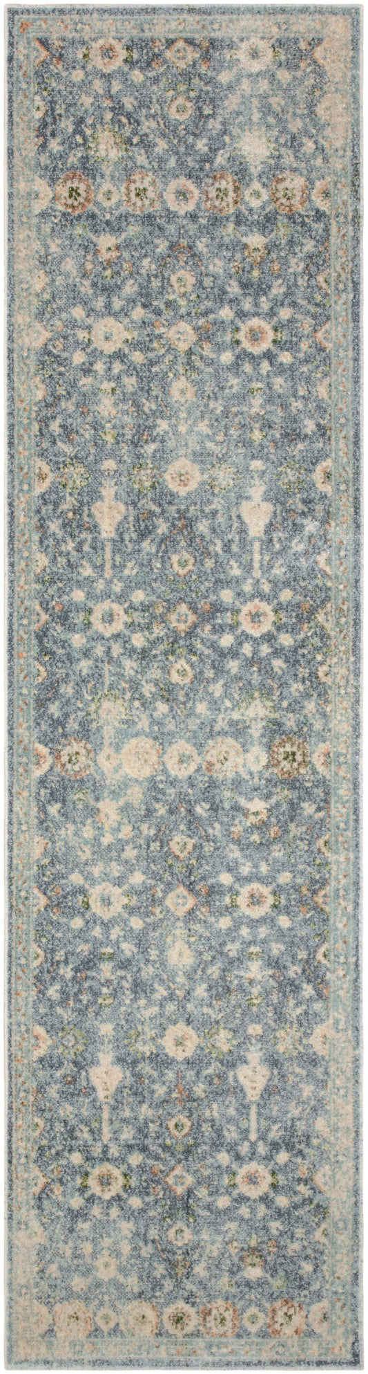 Blue-gray runner rug with cream floral motifs and a pale border.