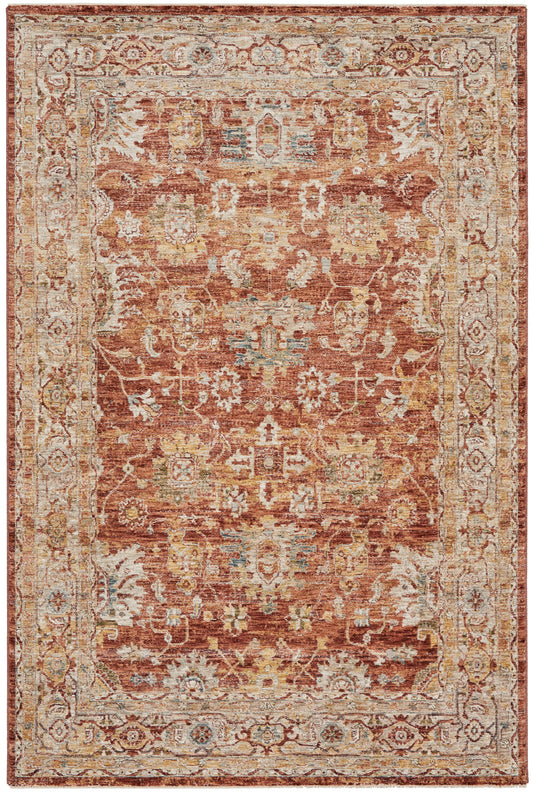 Rust-orange oriental rug with ivory, gold and pale blue floral motifs and an ornate cream border.