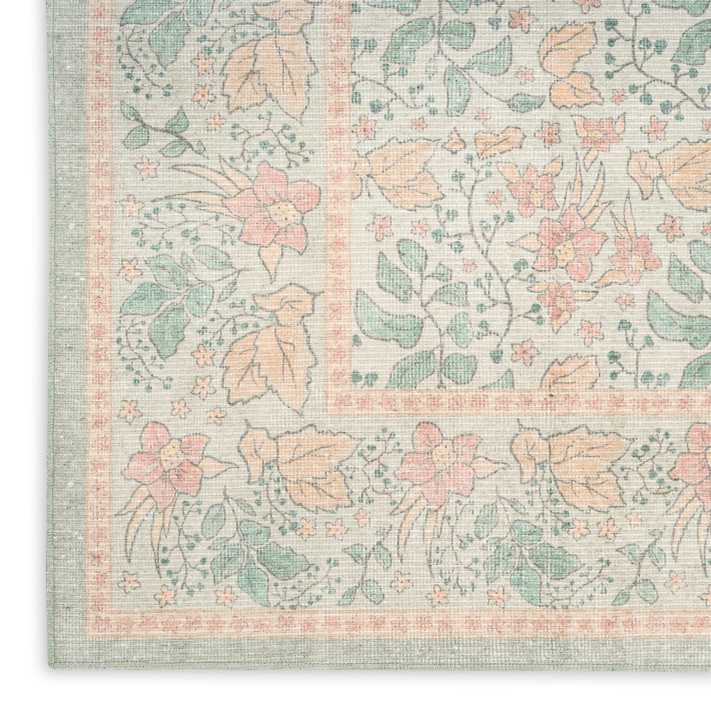 Pastel floral runner rug corner with mint, peach & pink blossoms, woven texture & decorative border.