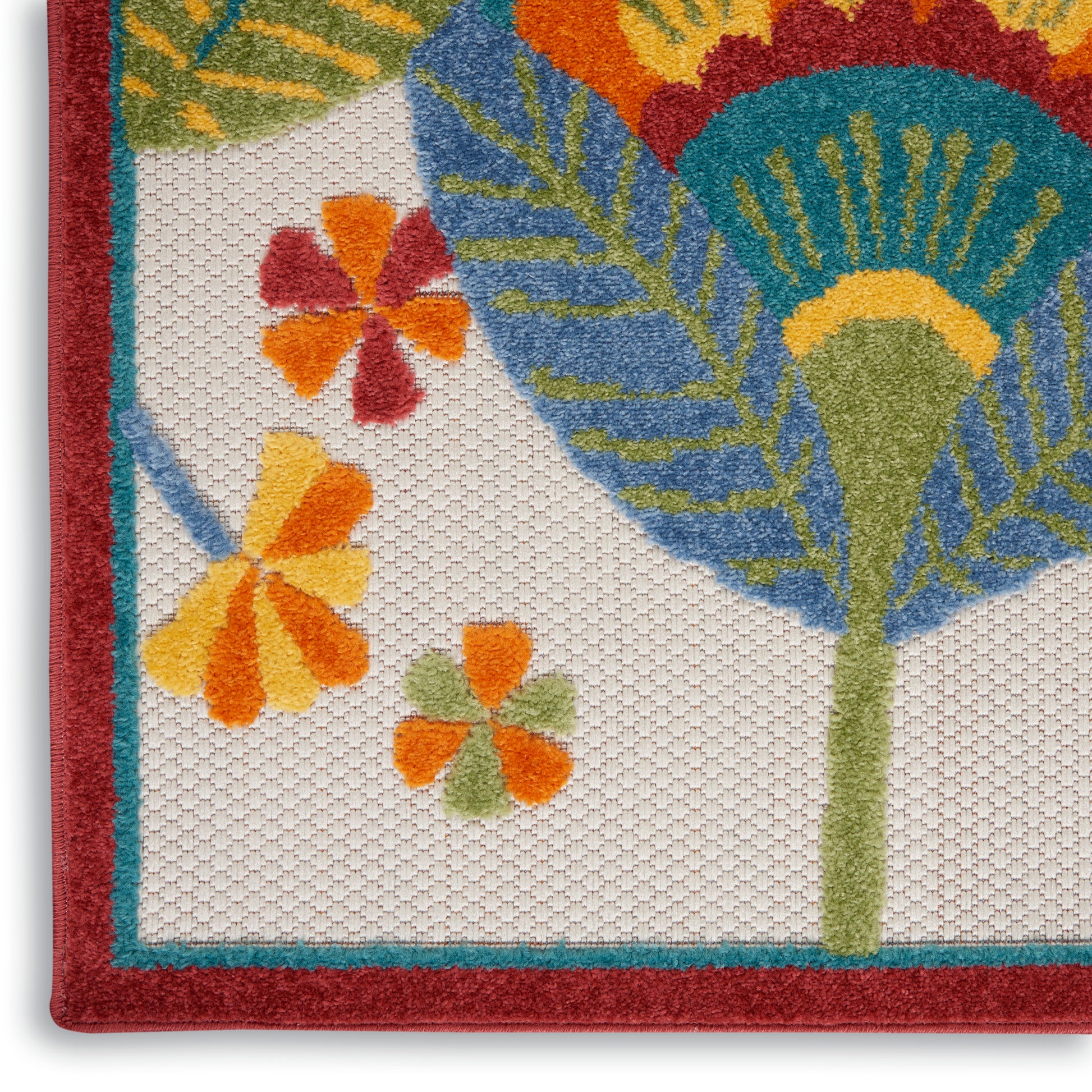 12' textured woven tropical floral rug runner with red border, teal edging, orange & yellow blossoms, and palm-like leaves