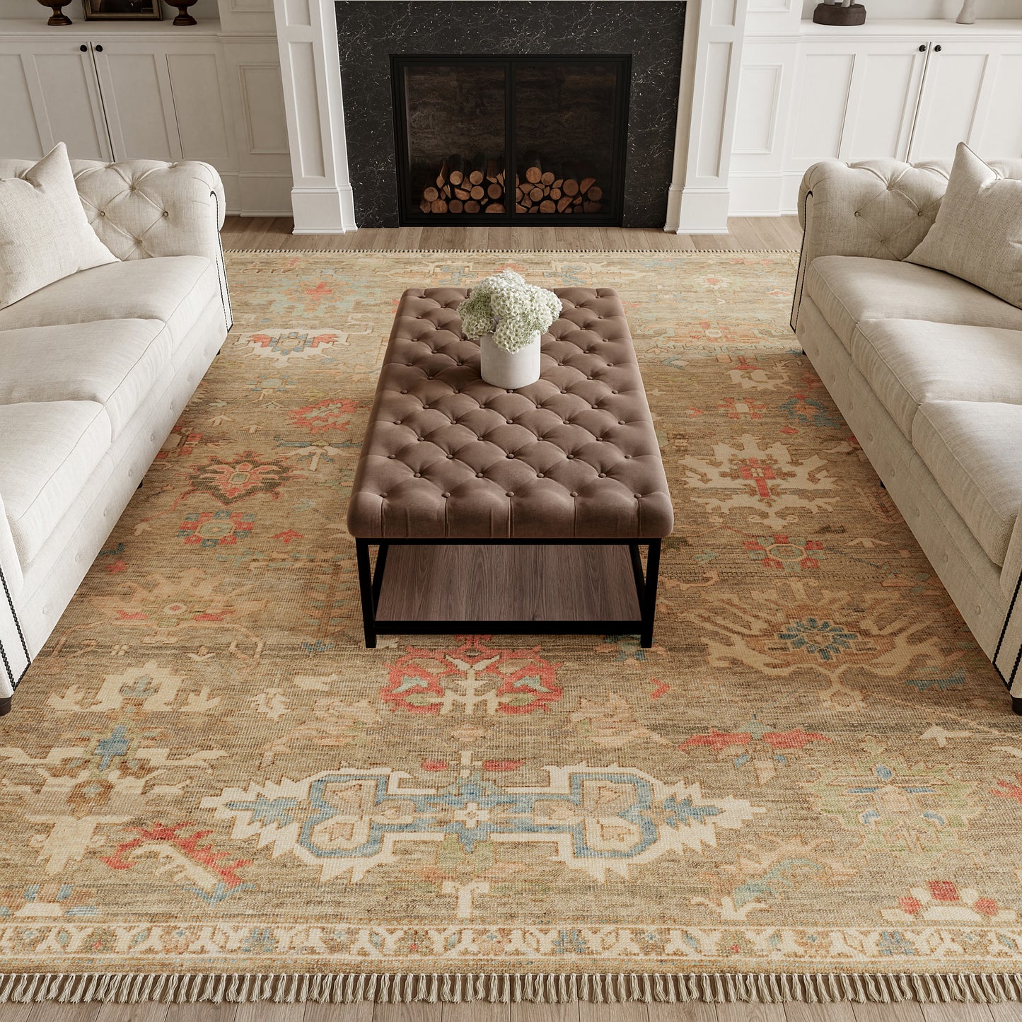 Brown tufted leather rectangular ottoman with black metal frame, on an ornate beige rug between white tufted sofas.