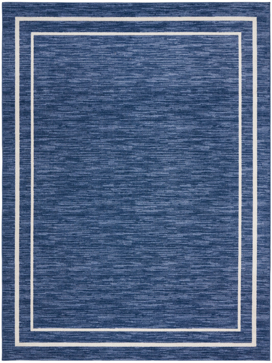Blue heathered area rug with white nested rectangular borders for a modern geometric look.