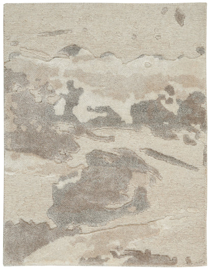 Neutral abstract area rug in beige, taupe, and gray; soft textured pile for modern living spaces.