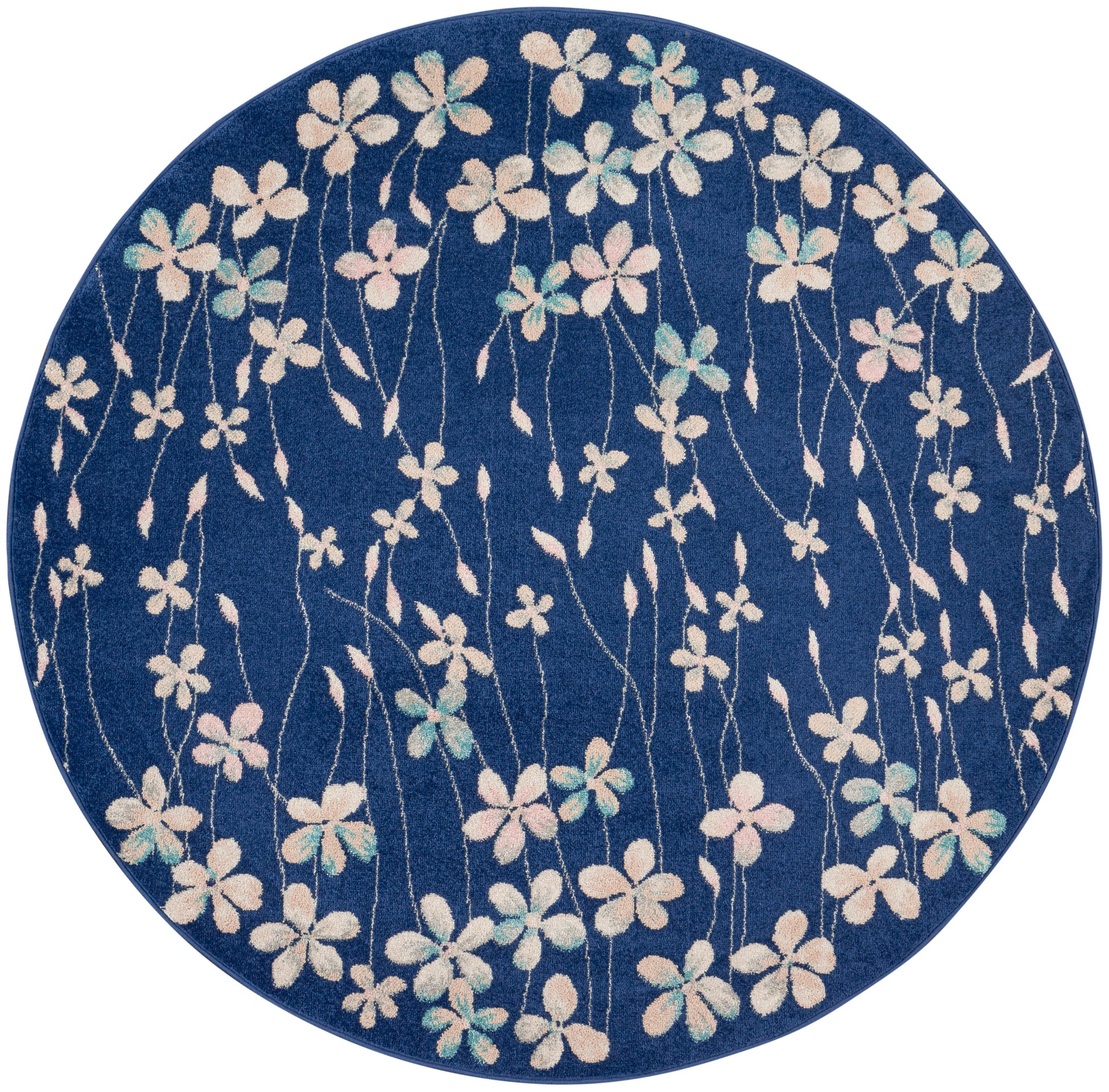 Round blue rug with white and pastel flowers on slender vines, a decorative floral pattern for floor decor.