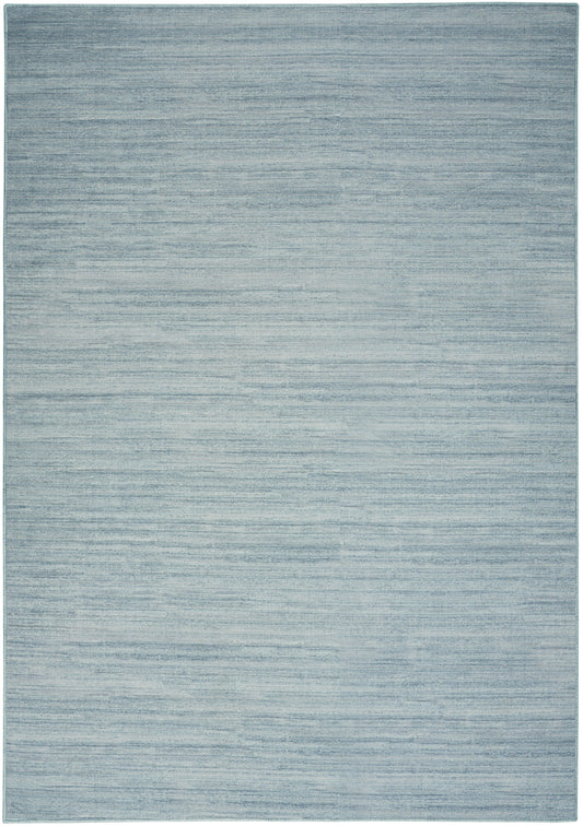 Light blue-gray area rug with subtle horizontal banding; rectangular modern rug for living room.